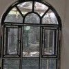 悦安花园独特半圆弧风格异形门窗完美收尾